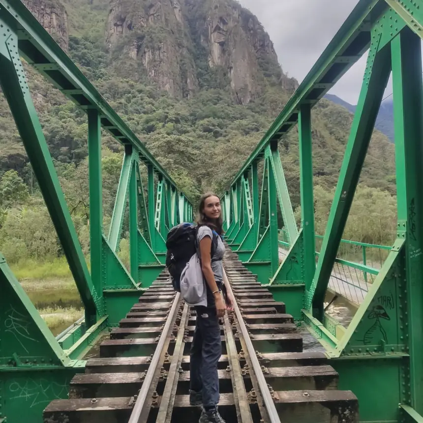 A green railway bridge on the way to Machu Picchu